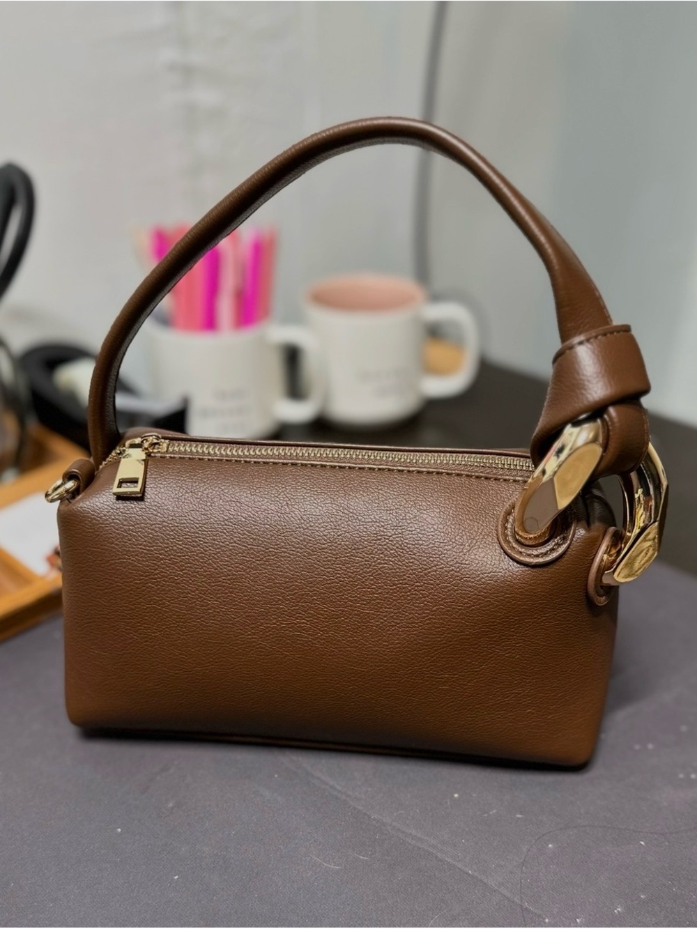 Elegant Brown Mini Top-Handle Bag with Gold Hardware